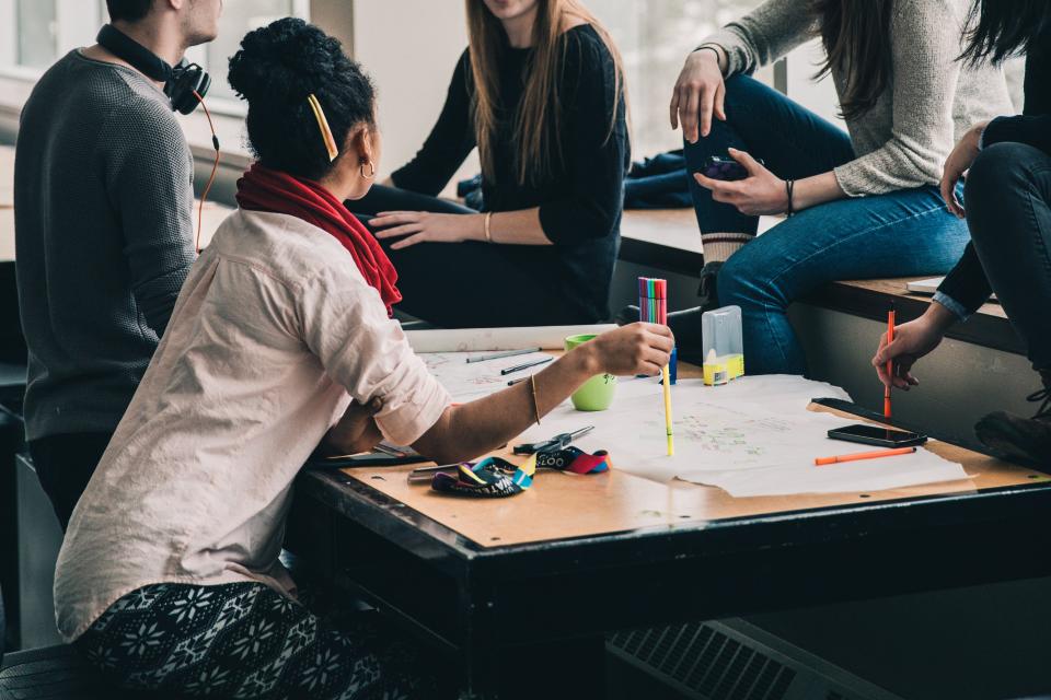 Remote workers connecting at a coworking space