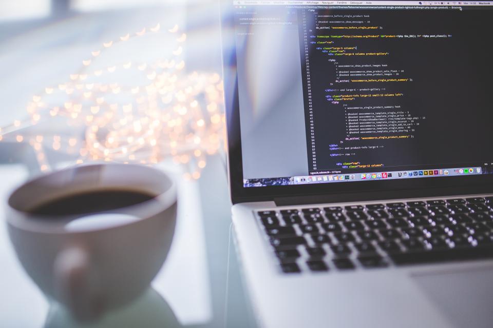 Remote worker surrounded by notifications and multiple screens showing context switching chaos